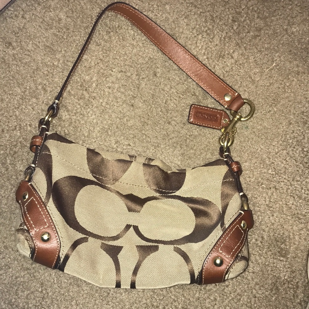 Brown and gold coach bag
